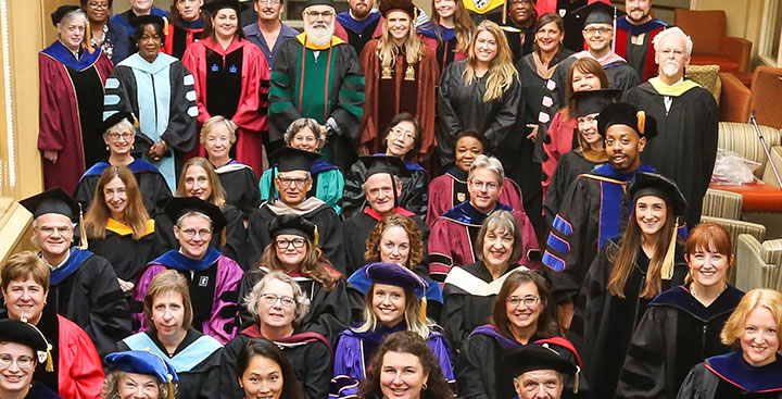 Curry College employs about 500 full- and part-time faculty and 81% hold a Ph.D or terminal degree in their field; faculty pictured here are convened for the annual academic convocation.