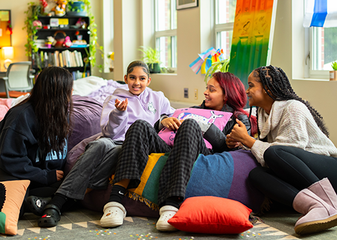 Student hang out and chat in the Curry College Diversity Center