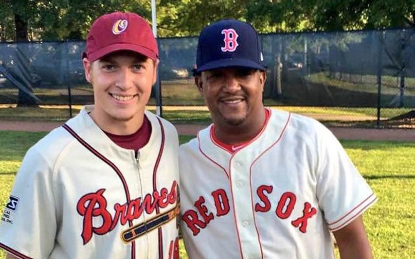 David Griffin, Class of 2018, with Pedro Martinez on baseball field