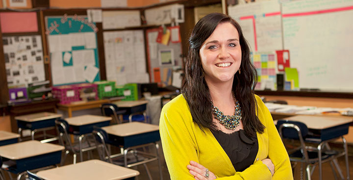 A Curry College Master of Education (M.Ed.) alumna pays stands proud in her very own classroom