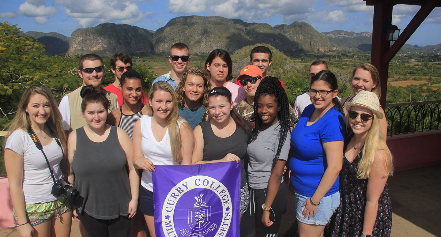 Curry College students pose for a photo in Cuba during a Study Abroad faculty led trip