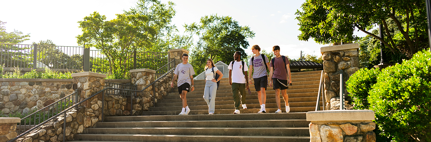Students walking down the Student Center, Westhaver Park stairs at Curry College
