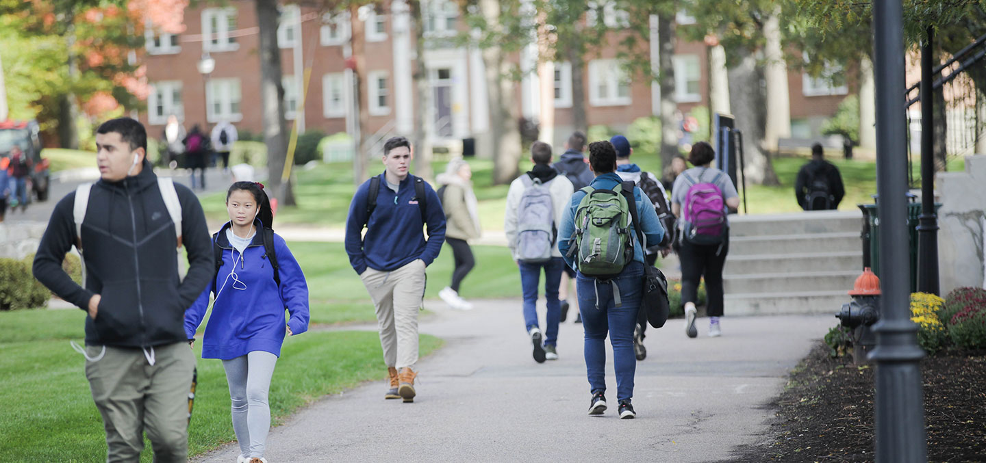 Curry College Students walking on campus representing Preview Curry Day