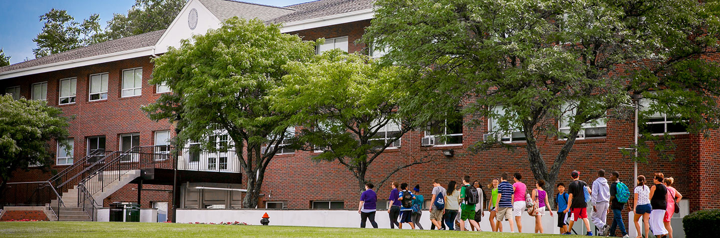 Students and parents on a campus tour at Curry College