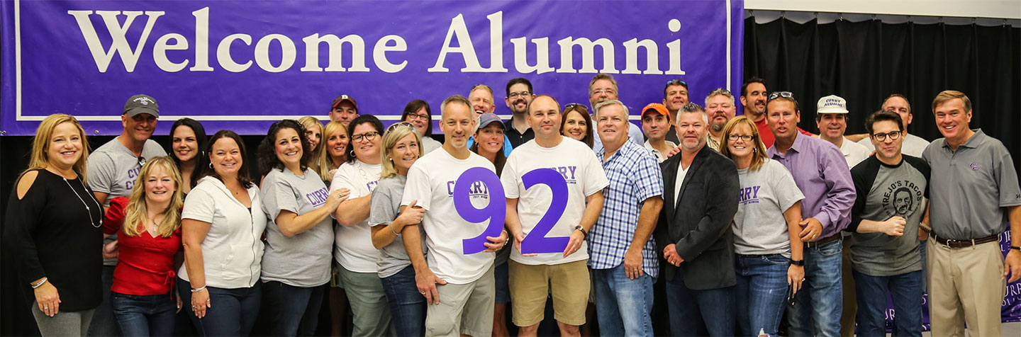 Our Class Notes page is represented by Curry College Alumni, Class of '92 posing for a photo at a recent Class Reunion
