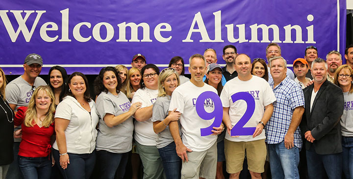 The Curry College Class of '92 poses for a photo at Homecoming