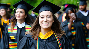 A student walks at Commencement