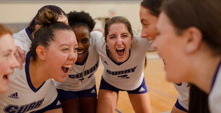Curry Colonels Women's Volleyball team celebrate a point