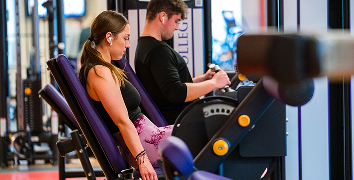 Students work out on the weight machines at the Curry College Fitness Center