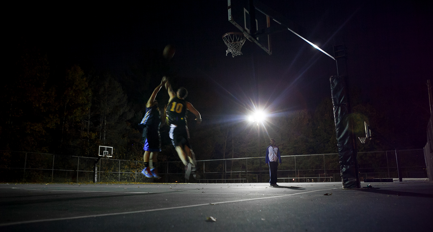 Outdoor basketball courts at night
