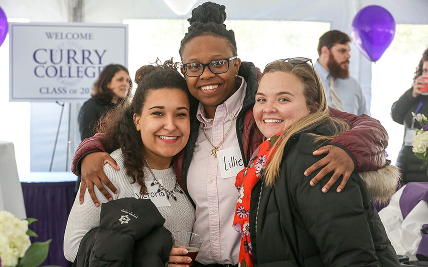 Students smile for a photo at Curry College Accepted Student Day