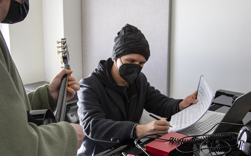 Jose Soto teaching private music lesson with student