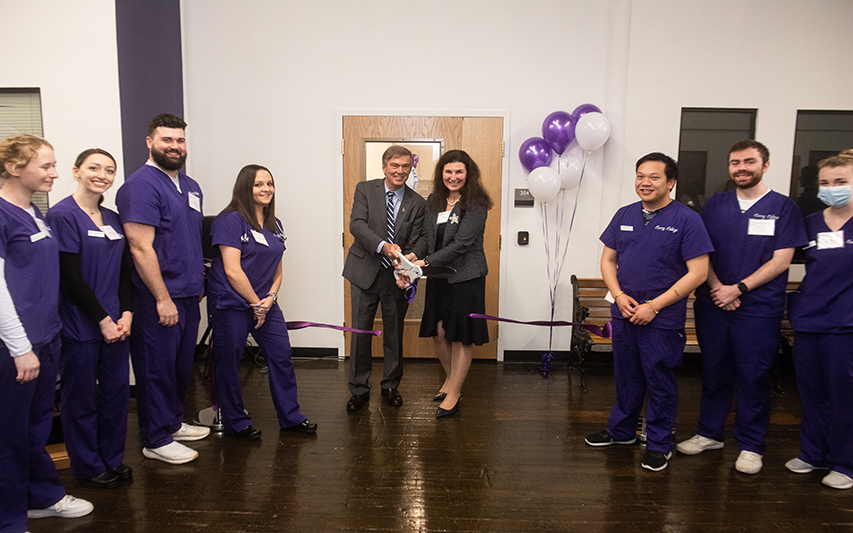 President Kenneth K. Quigley, Jr. and Dean of Curry School of Nursing Michelle McMahon cut the ribbon at the Plymouth campus