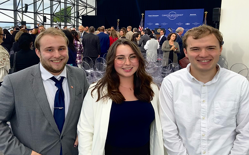 Communication students pose for a photo at President Joe Biden's Cancer Moonshot speech