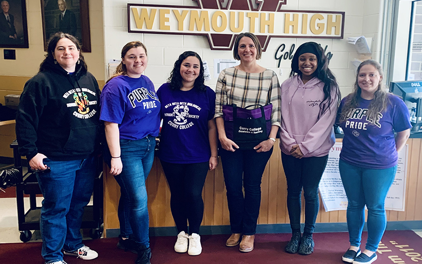 Members of the Women in STEM Club pose at Weymouth High School for workshop