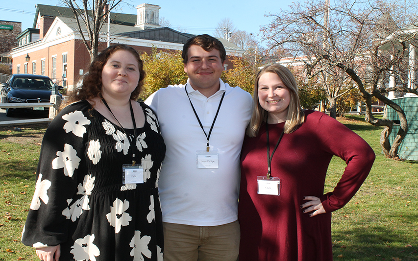 Curry student-presenters pose outside of Educators Rising conference
