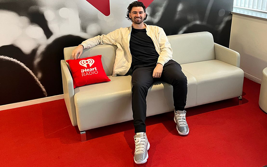 Brandon Clay '21 Sits Down in iHeartRadio Lobby for New Job