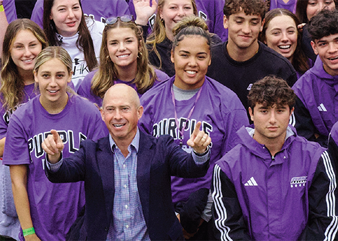 President Jay Gonzalez and Curry College Students pose for the Class photo