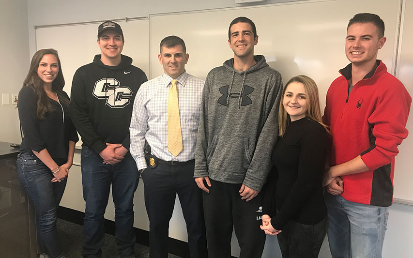 Special Agent Philip Belmont '04 with Criminal Justice students
