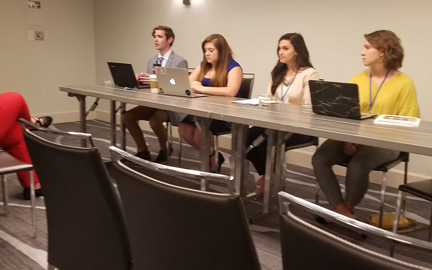 Communication student Jimmy Bonneau presents his research paper.