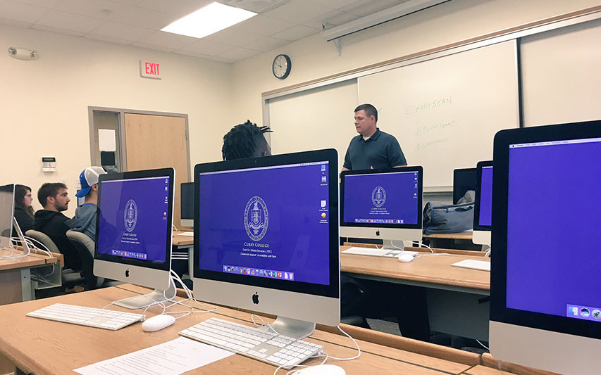 Boston Herald Sports Editor Sean Leahy in Communication class