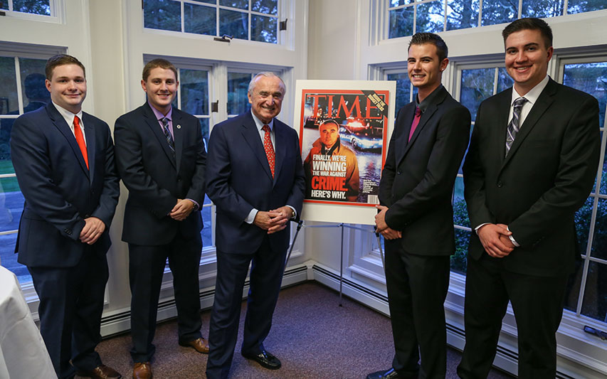 William J. Bratton with Criminal Justice students in the Keith Alumni House
