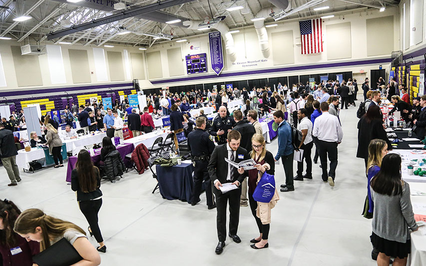 Career and Internship Fair inside Curry College Katz Gymnasium.