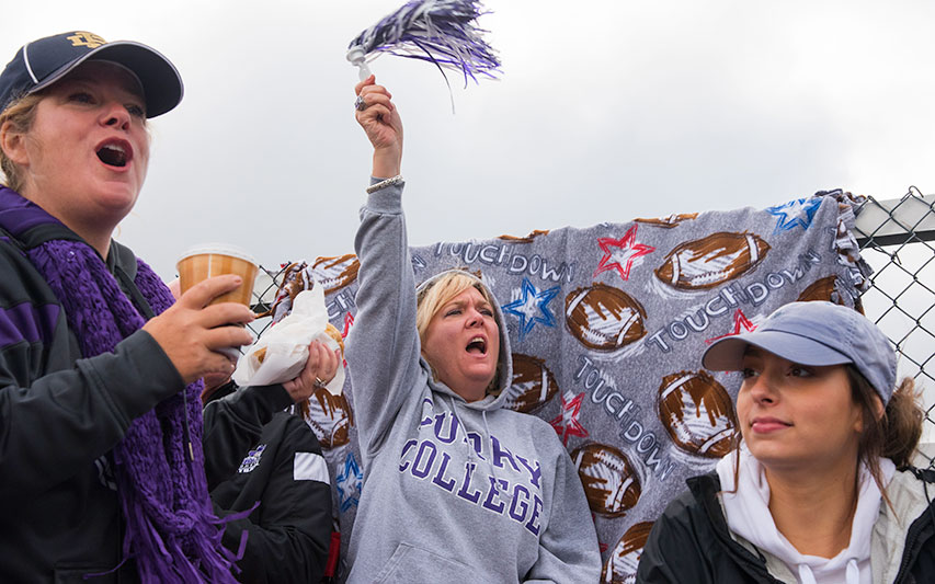 Curry Colonels fans cheer on the football team.