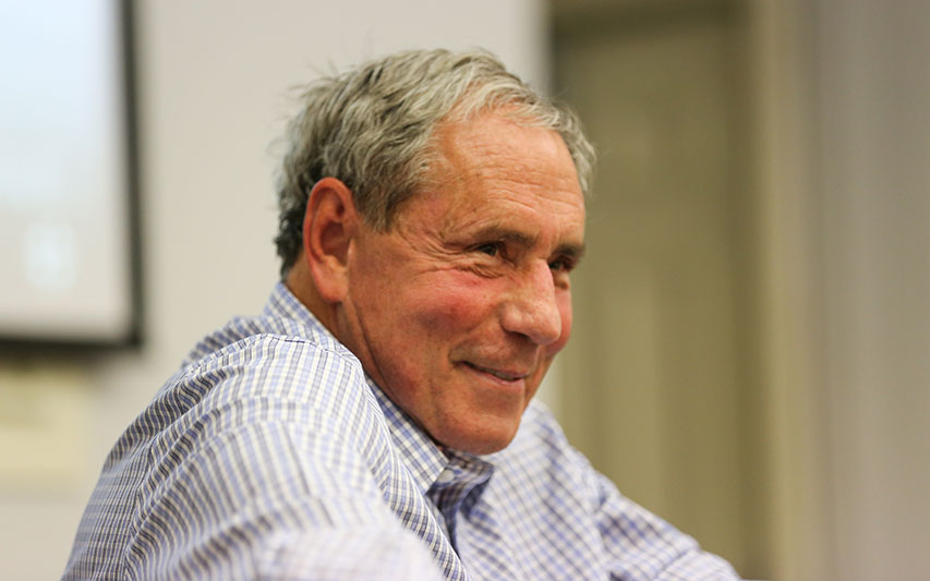 Iconic Sportscaster Bob Lobel smiles during guest lecture to Communication stduents.