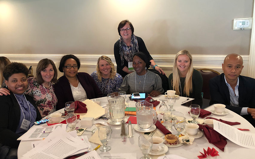 (L to R) Eva Bazile, Katherine O'Connor, Grace Mbawuke, Amy Lanigan, DeElla Johnson, (Dr Coleen Toronto in back), Kristyn Calla, and Noel Aguilar