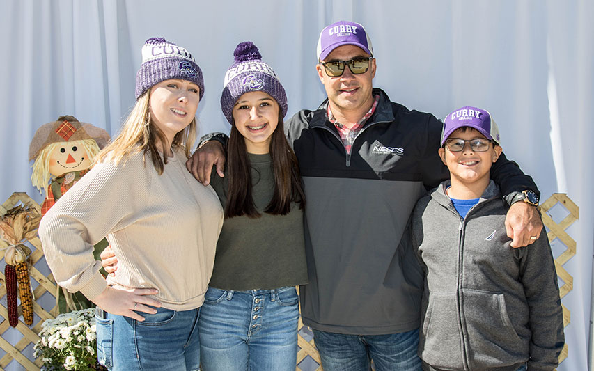 Families pose for pics at Curry College Homecoming and Family Weekend in October 2019