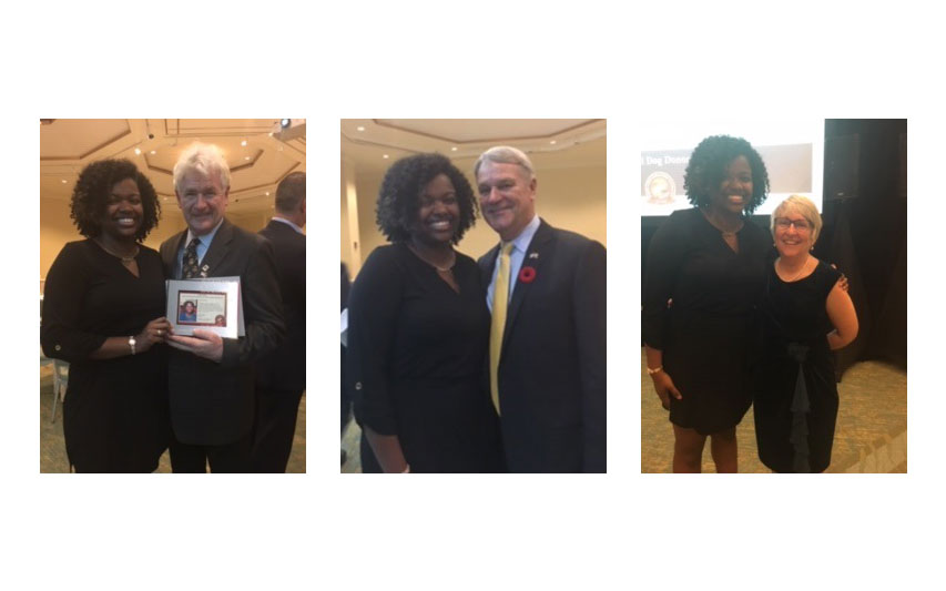 (Pictured left to right: Ismae Bailey (Class of 2021) with John McDermott, Veterans Advocate and Irish Tenor;  Tom Lyons, Veterans Advocate and MC; and Bettie Kilcoyne, Curry College Student Affairs)