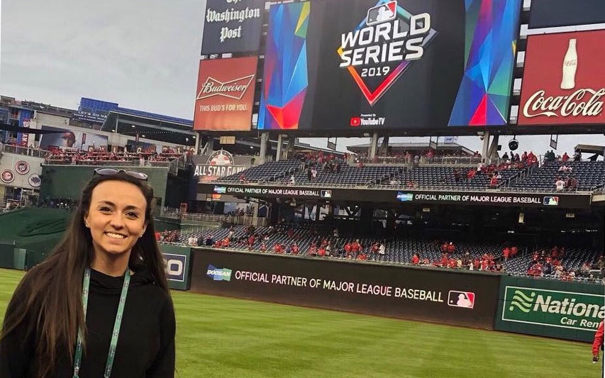 Gaby Dube '14 on the Nationals field at the World Series