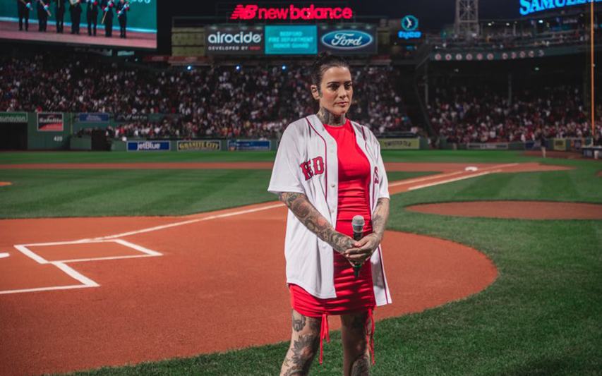 Lisa Bello '04 sings the National Anthem at the Red Sox vs. Yankees game in September of 2021