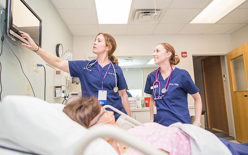 Curry College nursing students in the SIM Lab