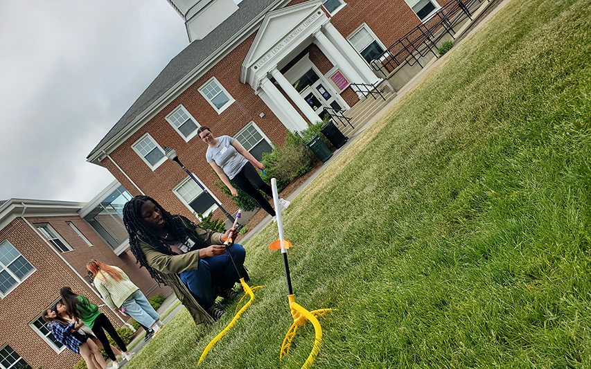 High School students prepare to launch rocket on Curry quad