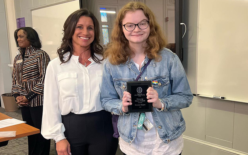 Emma Keyes Poses Next to Dr. Nicole Parsons with PAL Award