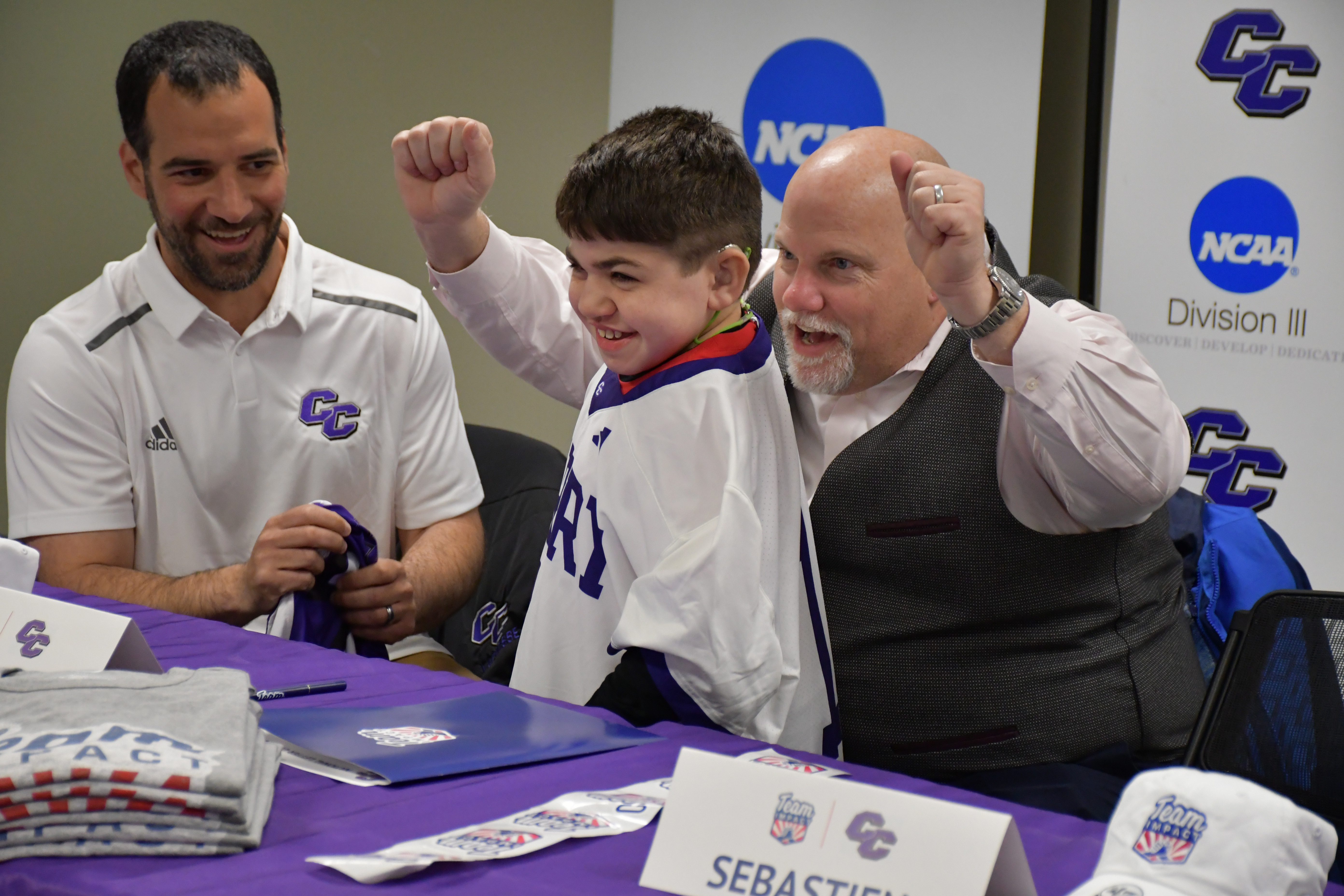 Sebastien signs on to the men's lacrosse team through Team Impact