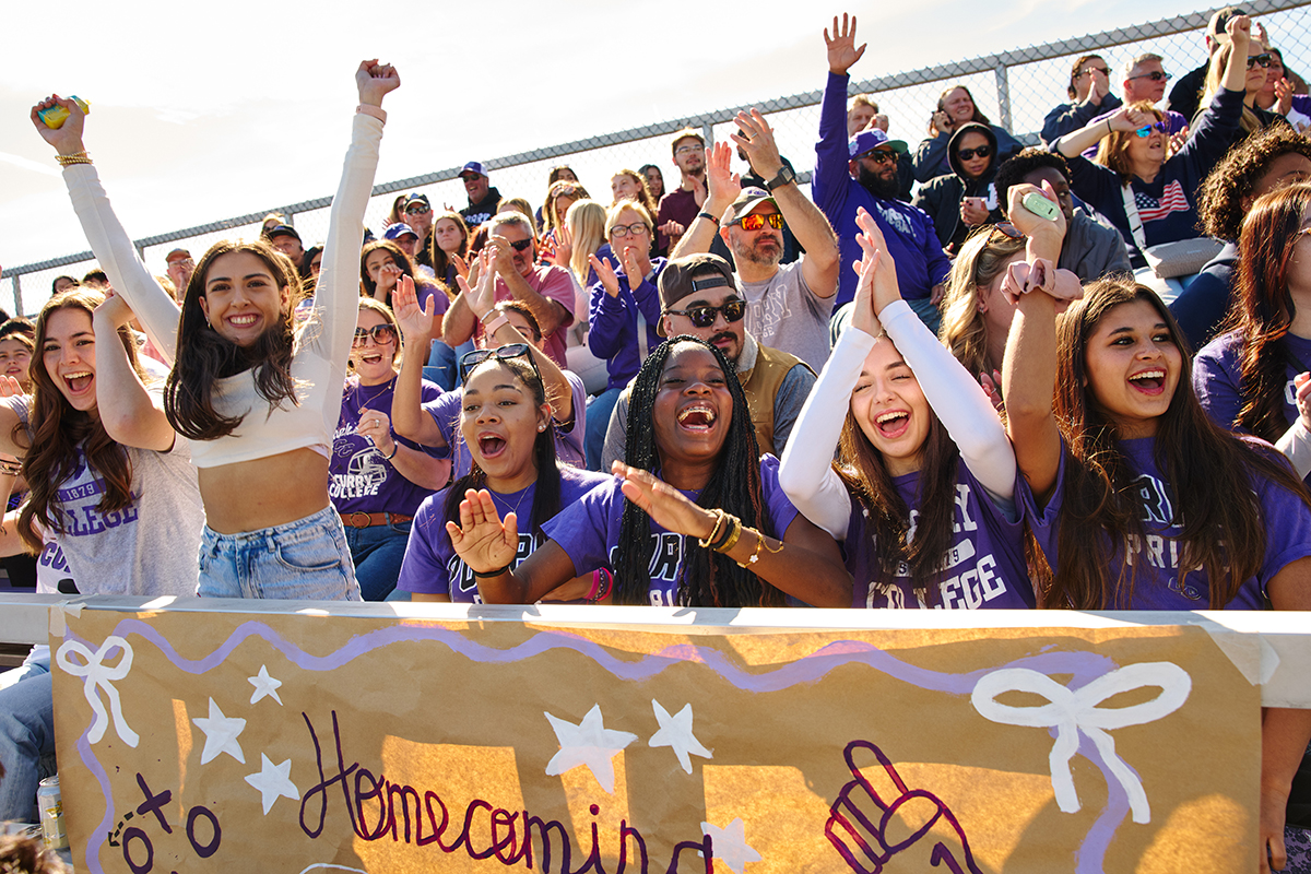 Homecoming crowd cheers in the stands