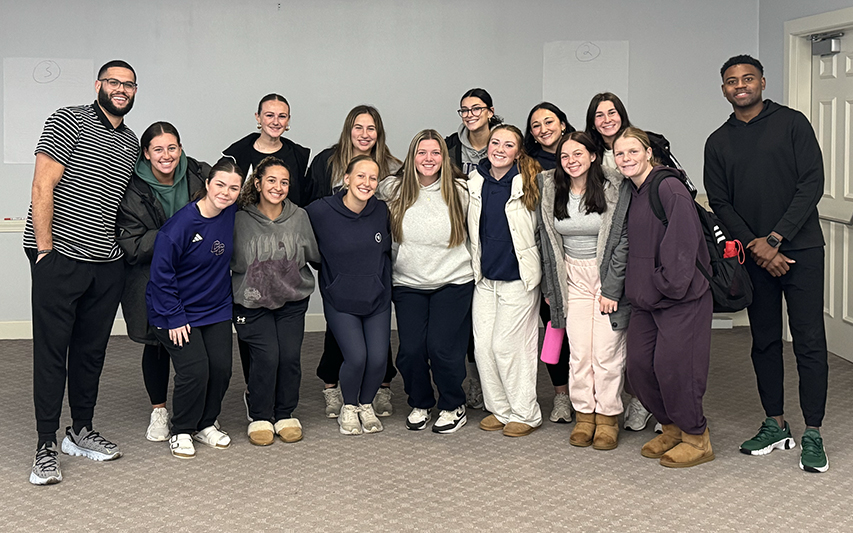 Student Athletes Pose with NDUR staff after session