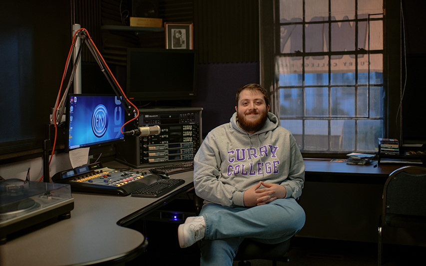 Tyler Milliken sits in WMLN Station