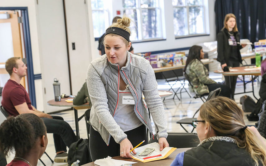 Students participate in School of Nursing poverty simulation.