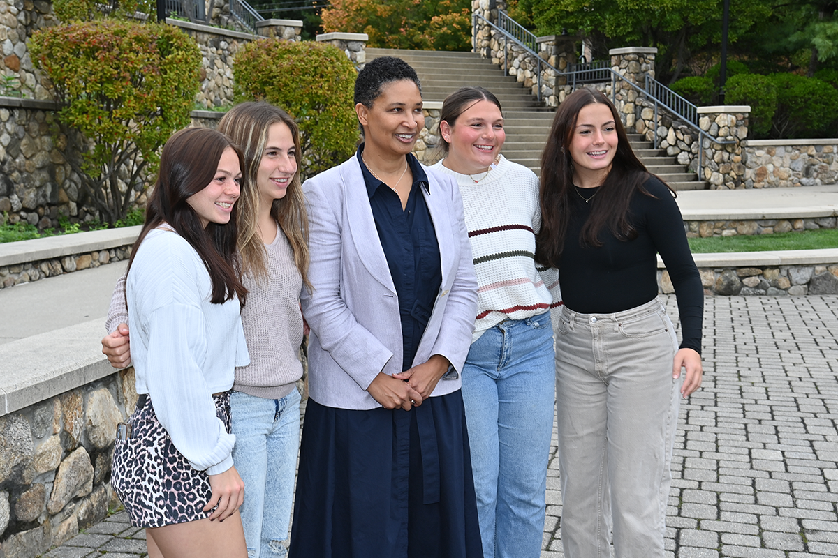 Dr. Danielle Allen poses for a picture with Curry College President's Leadership Program students