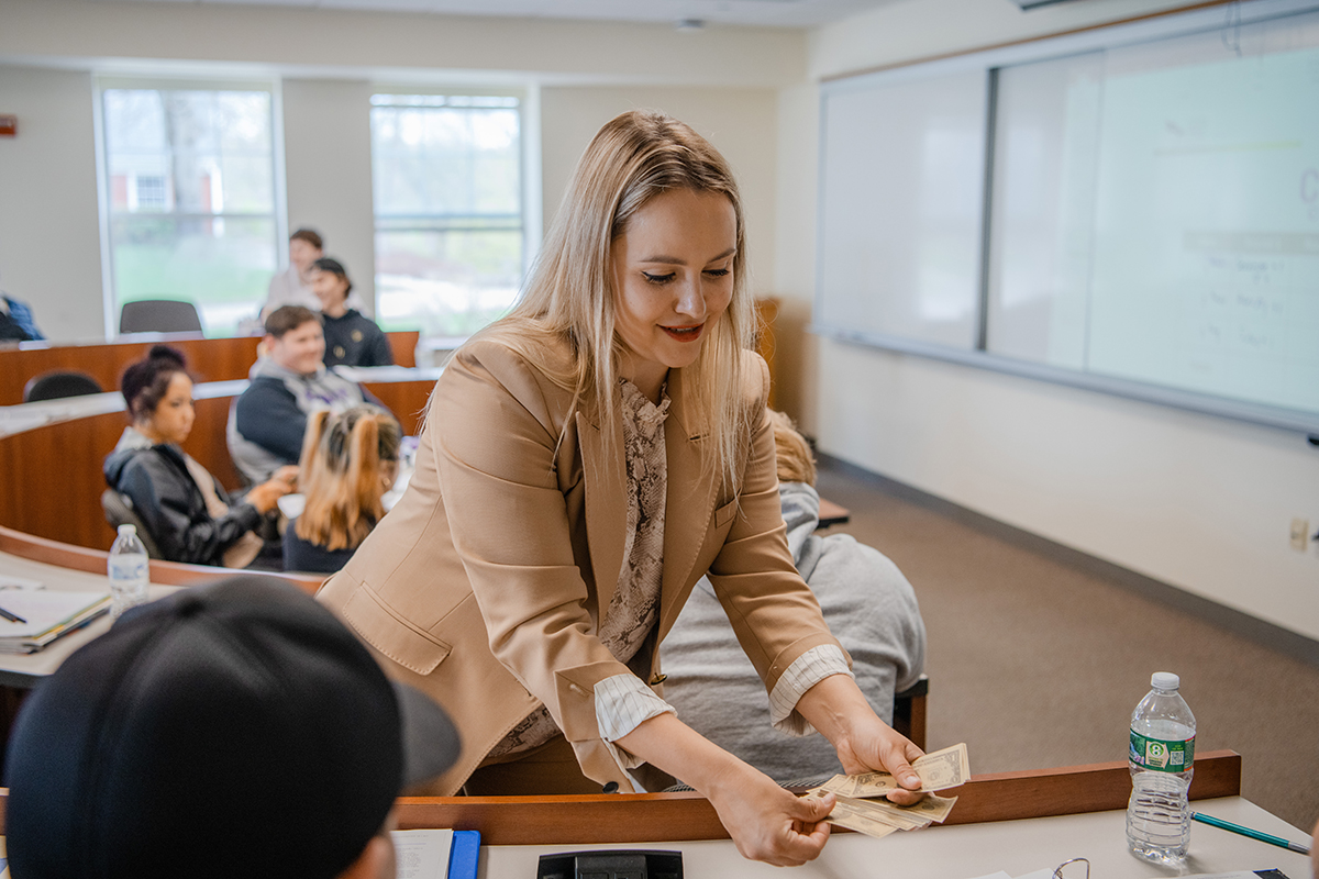 Macro professor hands out money
