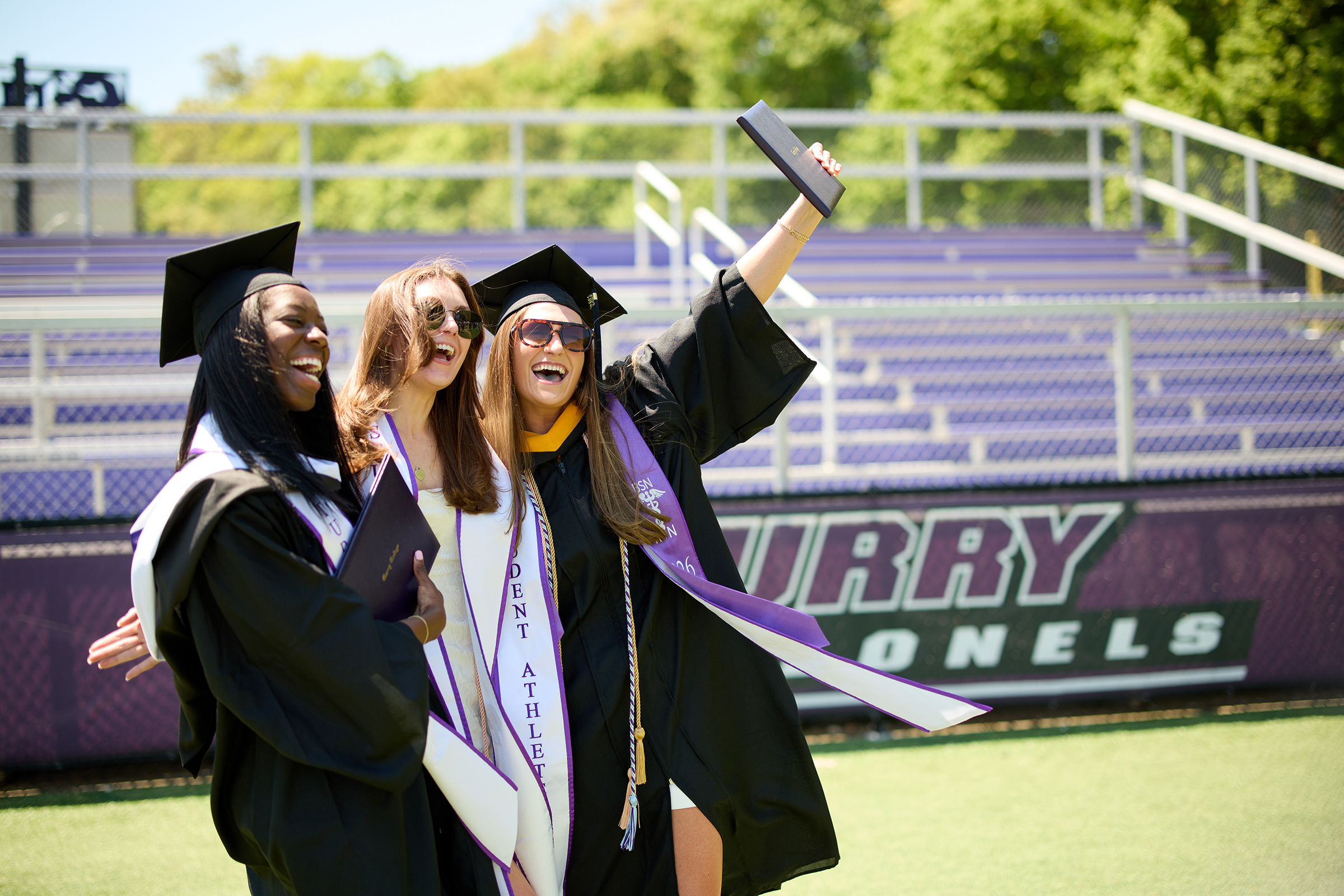 Students happy posing for graduation