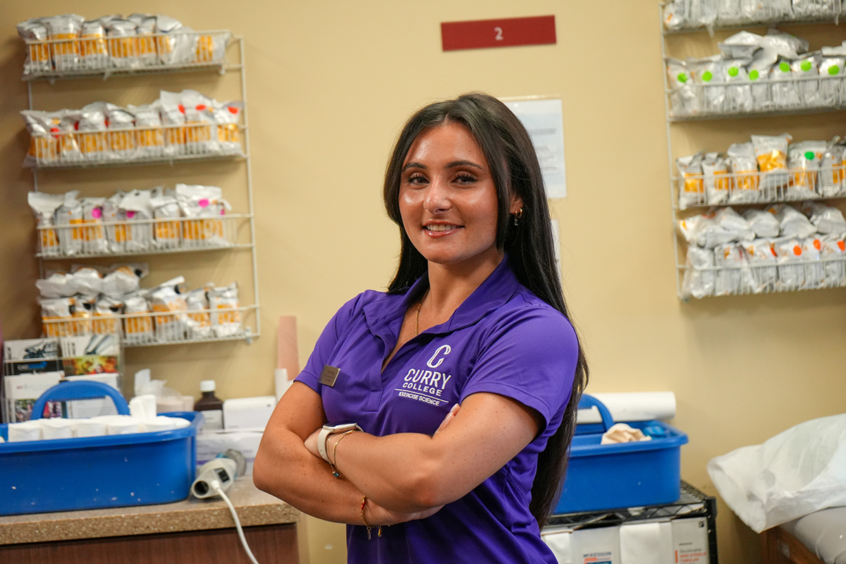 Mia Schena poses in orthopedic room
