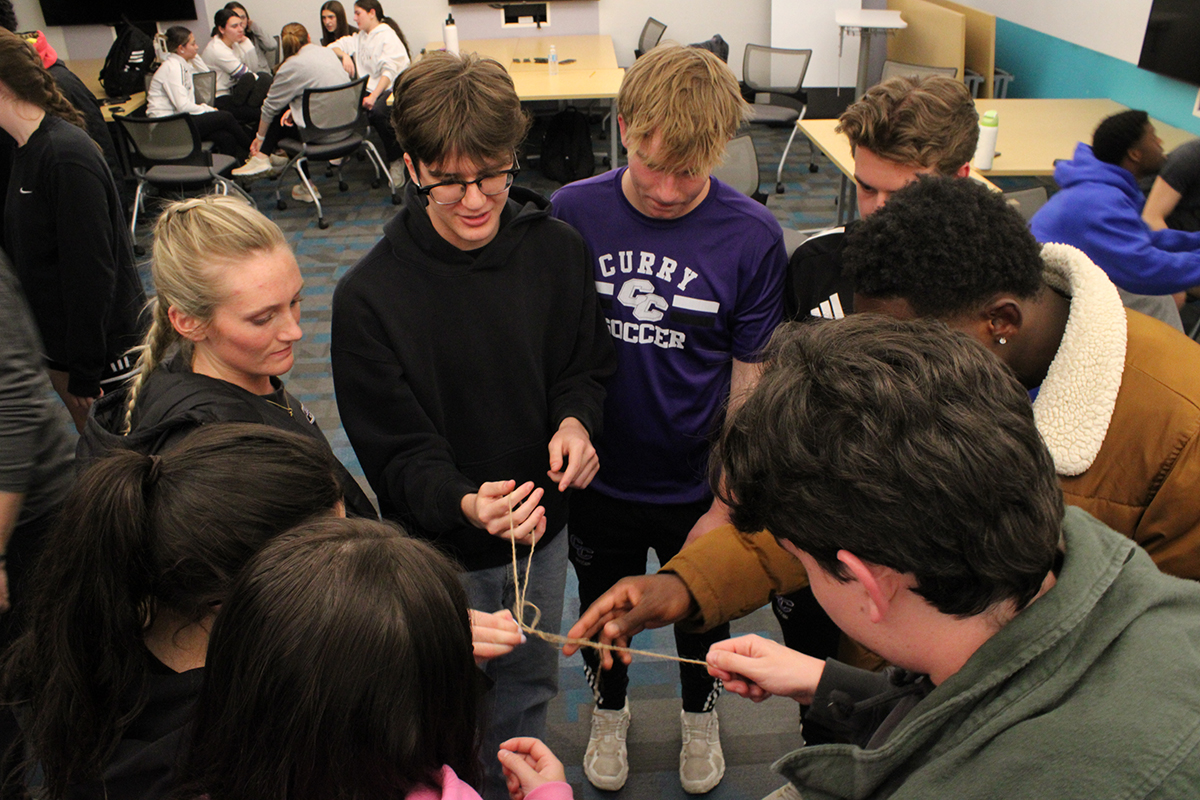 students engage in team building activity