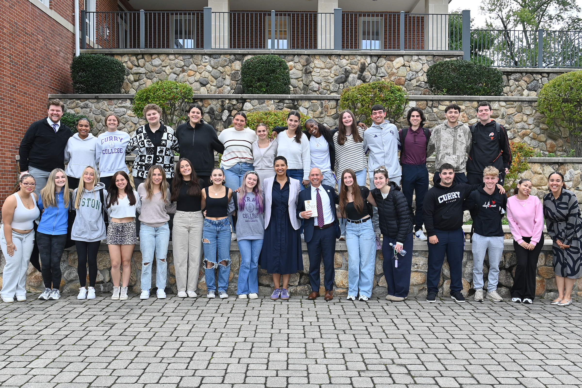 Dr. Danielle Allen poses for a picture with Curry College President's Leadership Program students and staff