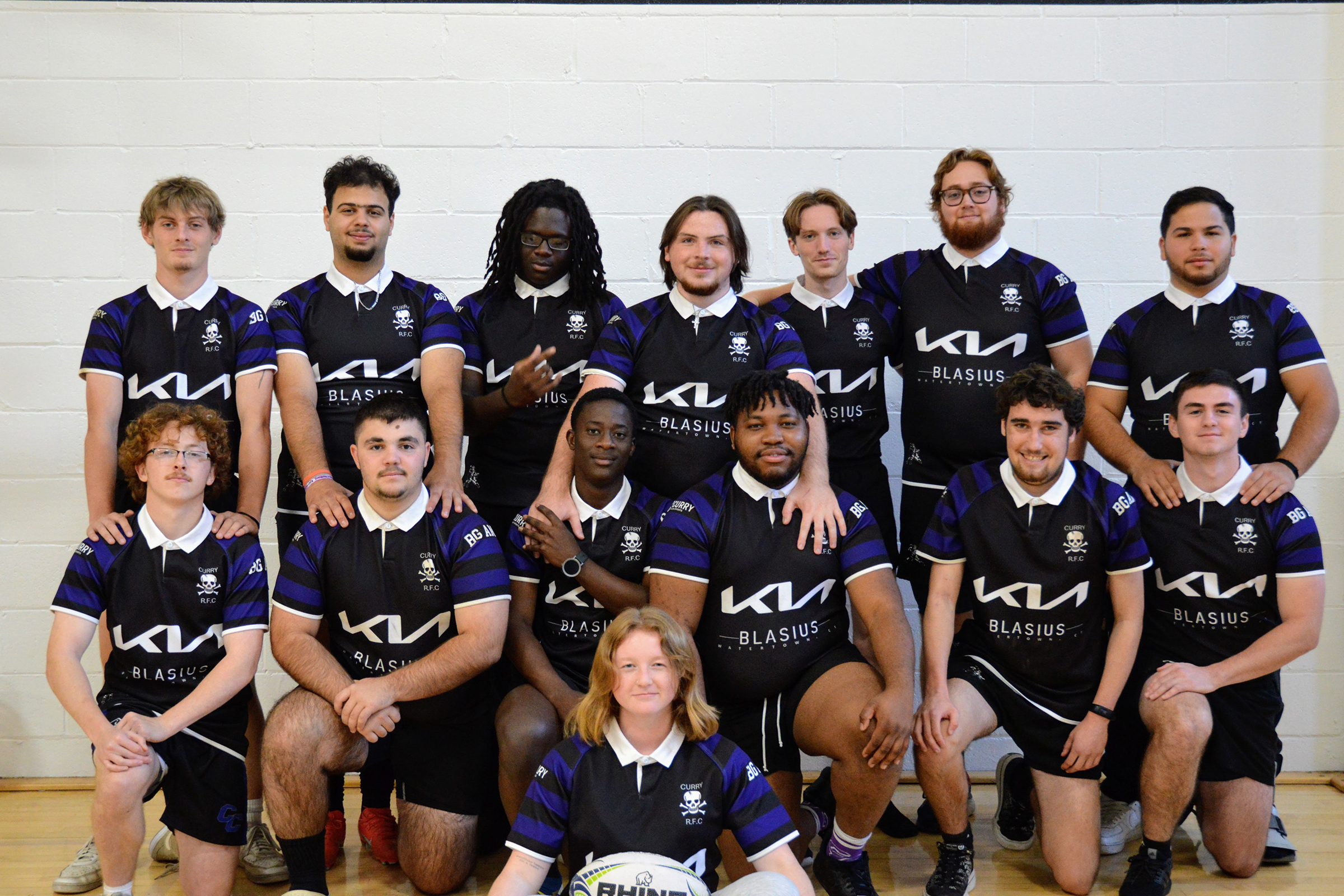 Rugby team poses for team photo