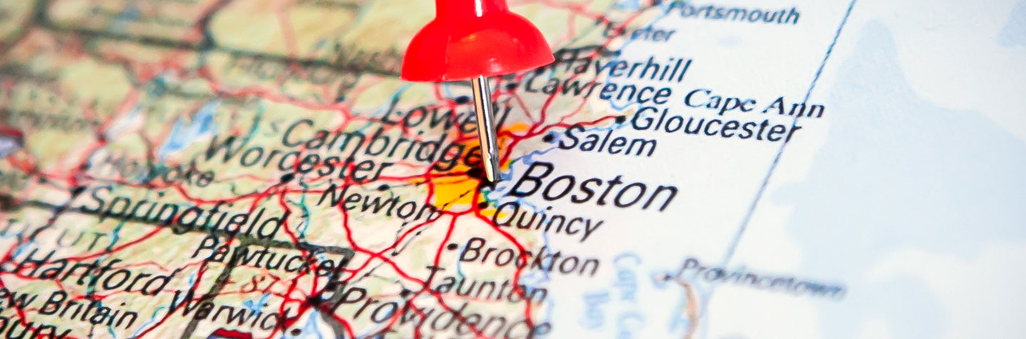 A map of Massachusetts with a pin in Boston